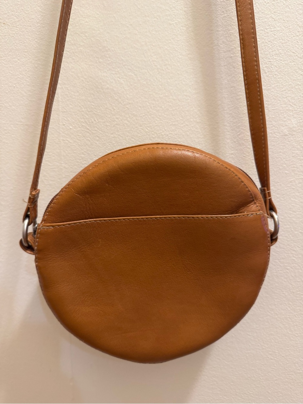 Genuine Leather Round Crossbody Bag with back pocket.